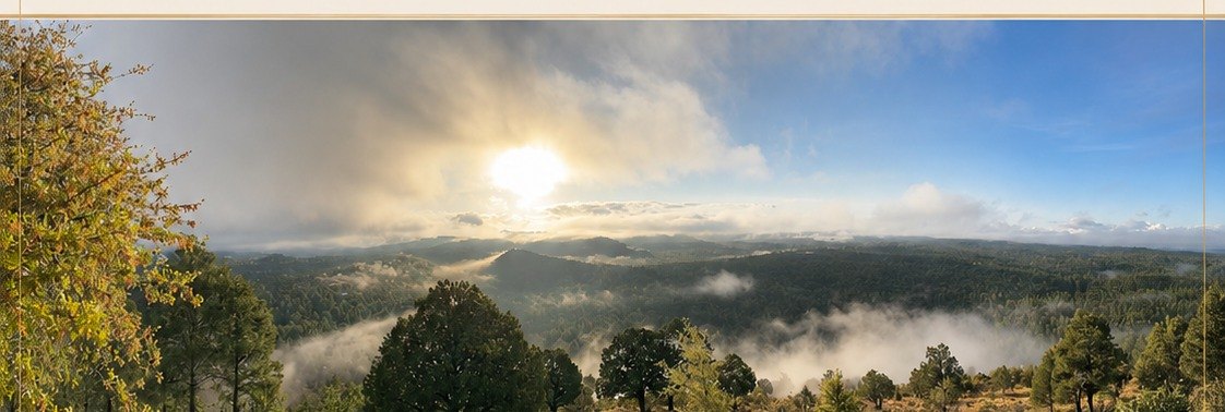 Clouds and morning light over the forested Prescott landscape.